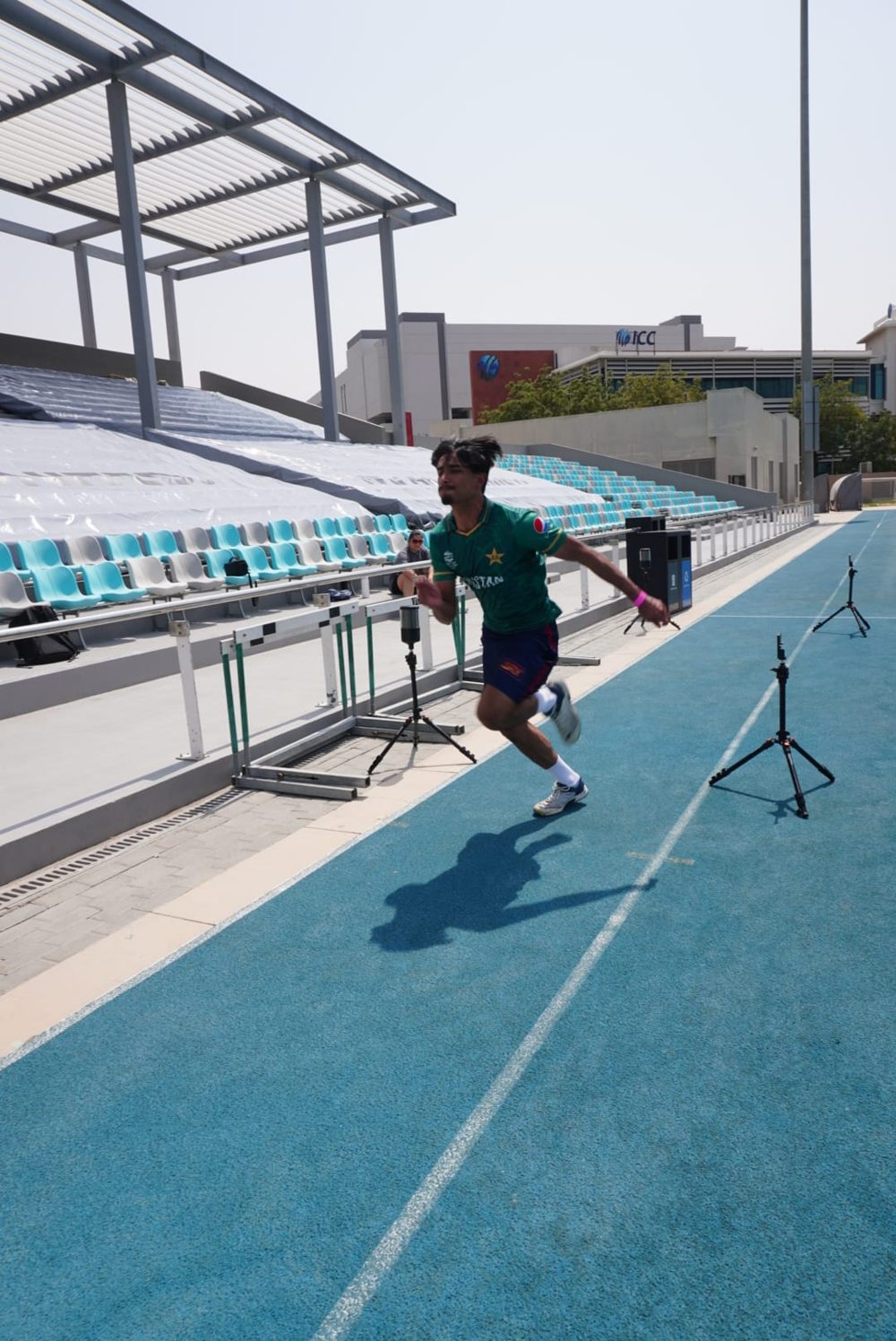 Cricketer sprinting through timing gates